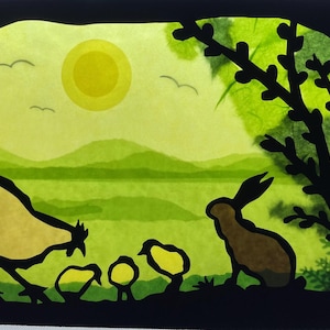 May include: A paper cut-out illustration of a hen with chicks, a rabbit, and a tree in a green field with a yellow sun in the sky.