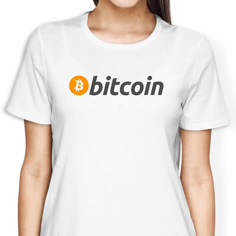 May include: White t-shirt with a black and orange Bitcoin logo and the word "bitcoin" printed on the front.