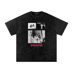 May include: Black t-shirt with a faded, vintage look. The shirt features a four-panel black and white graphic and the red text "BEGOTTEN" at the bottom. Above the graphic is the text "Something for... Color of Blood?"