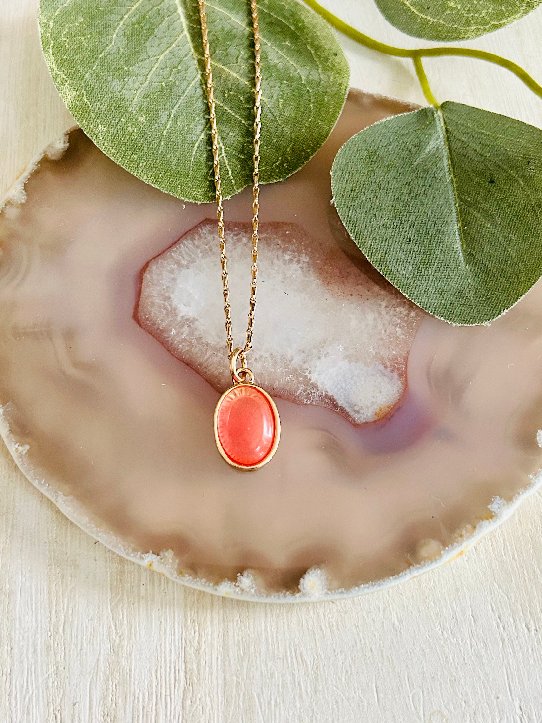 Pink stone gold best sale necklace