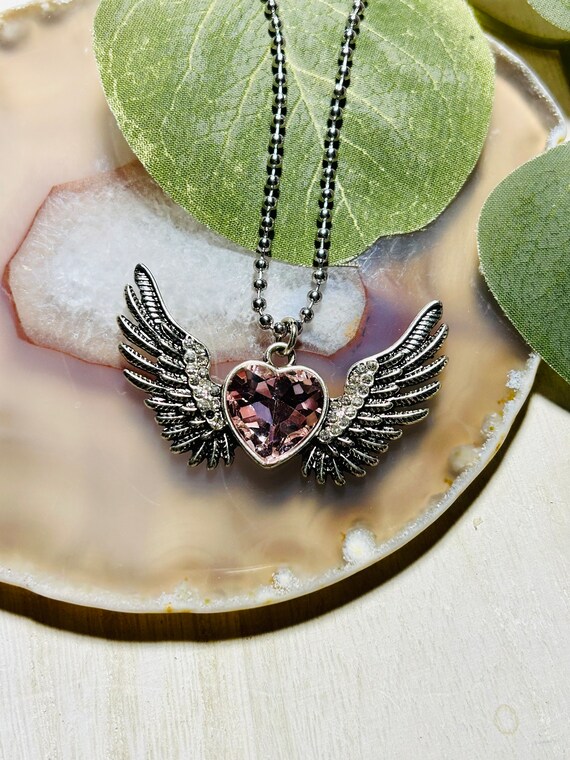 Heart store wing necklace