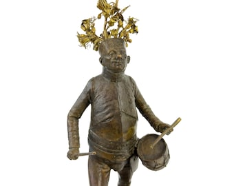 Ironic Bronze Drummer Sculpture: Whimsical Bookshelf Decor by Shevchuk Dmitry