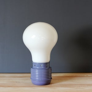 Space age table lamp in the shape of a light bulb