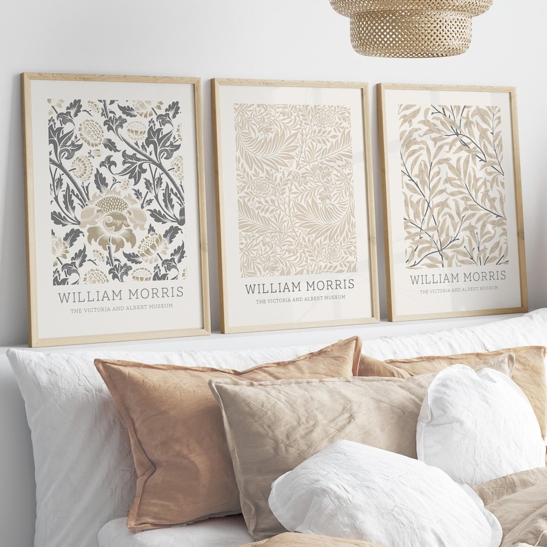 May include: Three framed prints with floral patterns in shades of beige and gray. The prints are titled "William Morris" and "The Victoria and Albert Museum".
