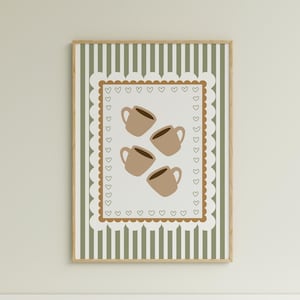 May include: A framed art print featuring four brown coffee mugs on a white background with a brown heart-shaped border. The background has a green and white striped pattern. The frame is a light brown color.