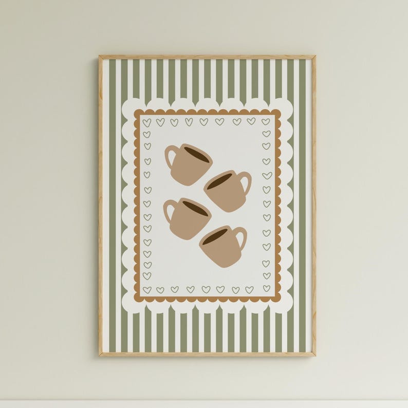 May include: A framed art print featuring four brown coffee mugs on a white background with a brown heart-shaped border. The background has a green and white striped pattern. The frame is a light brown color.