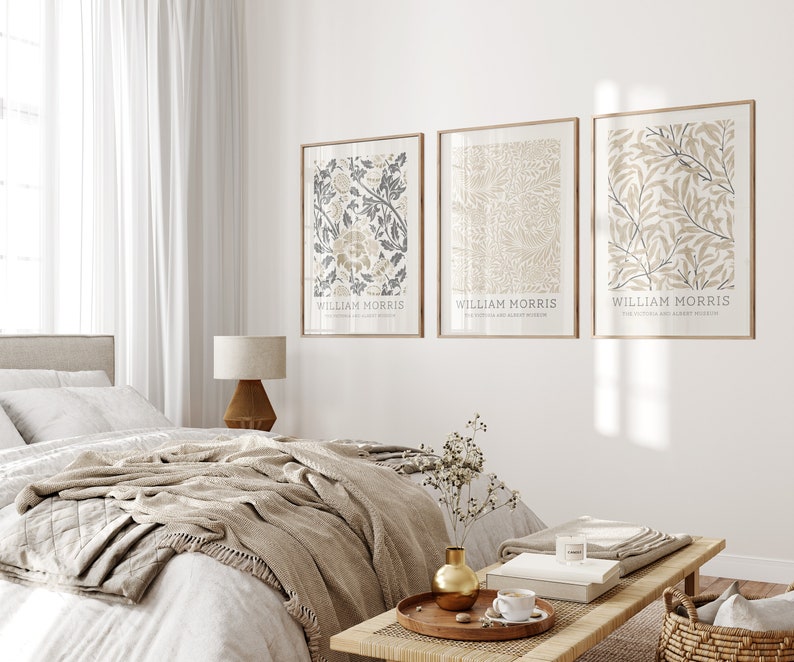 May include: Three framed prints with botanical illustrations in shades of beige and gray. The prints feature the text "William Morris" and the Victoria and Albert Museum logo.
