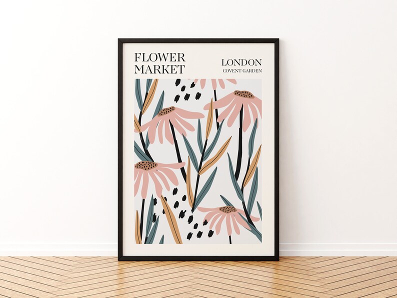 May include: A framed print with a floral design featuring pink flowers, green leaves, and black and brown accents. The text "FLOWER MARKET LONDON COVENT GARDEN" is printed at the top of the print.
