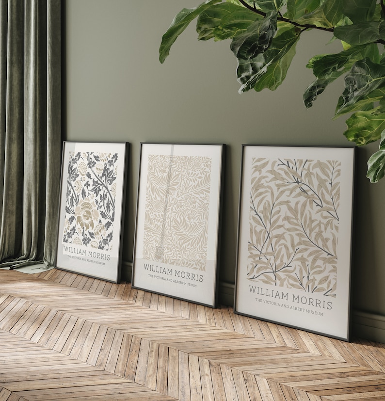May include: Three framed prints with botanical illustrations in shades of beige and gray. The prints feature the text "William Morris" and "The Victoria and Albert Museum".