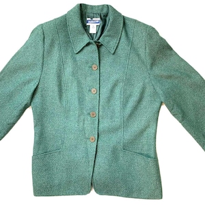 May include: A teal-colored blazer with a collared neckline and three buttons down the front. The blazer has two front pockets and three-quarter length sleeves. The brand name "Pendleton" is visible on the label.