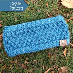 May include: A teal blue crocheted headband with a brown leather tag that says "Nicole's Creations".