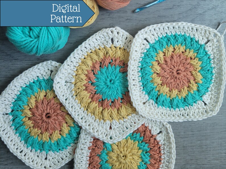 May include: Four crocheted squares in shades of teal, yellow, and orange. The squares are made with a white border and have a circular pattern in the center.