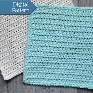 May include: Two crocheted dishcloths, one white and one light blue, with a textured stitch pattern.  The dishcloths are laid out on a wood surface.  Digital Pattern.