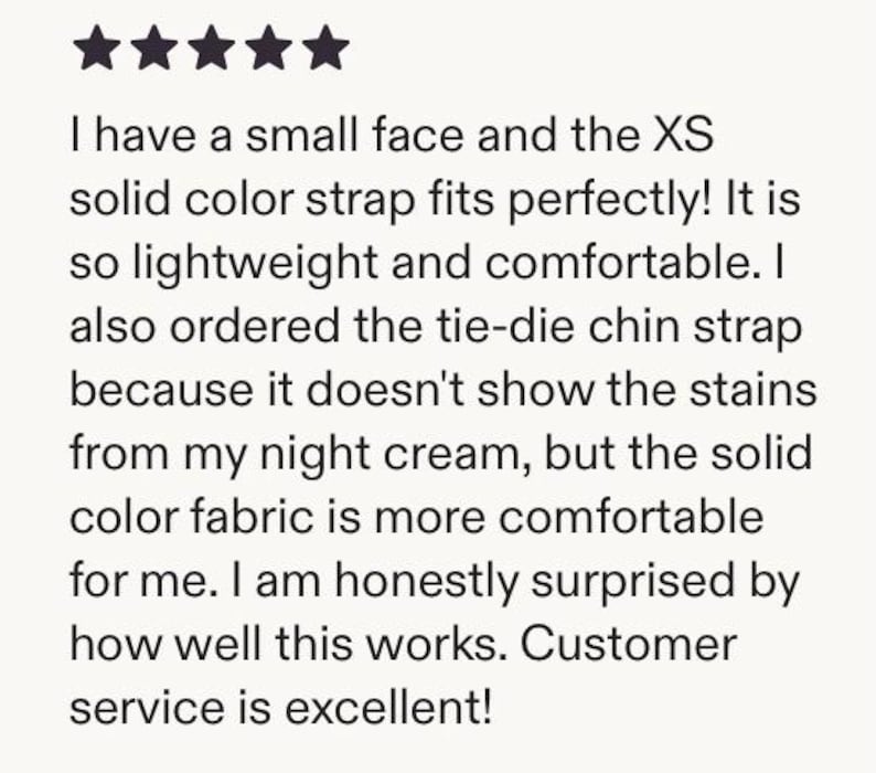 May include: A customer review with a five-star rating. The text mentions a solid color strap that fits perfectly, is lightweight and comfortable. The reviewer also ordered a tie-dye chin strap.