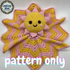 May include: A crochet pattern for a yellow and pink sun-shaped baby blanket. The pattern includes a smiling sun face with black eyes and a pink mouth. The text "pattern only" is written in large, colorful letters at the bottom of the image.