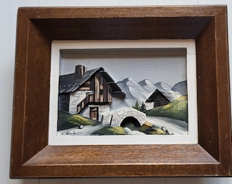 Mountain painting in carved wood