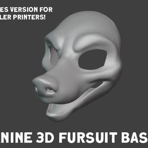 May include: A gray 3D-printed canine fursuit base. The image includes the text "INCLUDES VERSION FOR SMALLER PRINTERS!" at the top and "CANINE 3D FURSUIT BASE!" at the bottom. The base features a snout, eye sockets, and a jaw.
