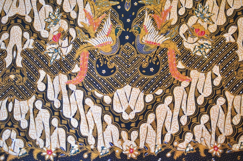 May include: Black and gold fabric with a repeating pattern of stylized birds, flowers, and geometric shapes. The fabric has a traditional Indonesian batik design.