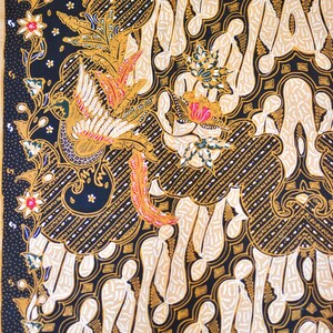 May include: A black and gold fabric with a traditional Indonesian batik pattern. The pattern features stylized figures, flowers, and a bird.