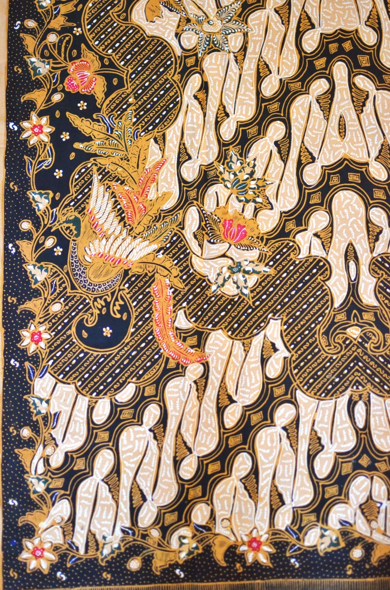 May include: A black and gold fabric with a traditional Indonesian batik pattern. The pattern features stylized figures, flowers, and a bird.
