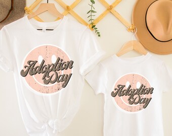 Bijpassende familie-T-shirts met retro smiley