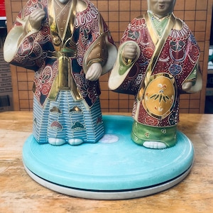 Vintage Japanese Kutani porcelain figurines, often referred to as Jo and Uba, or Takasago dolls