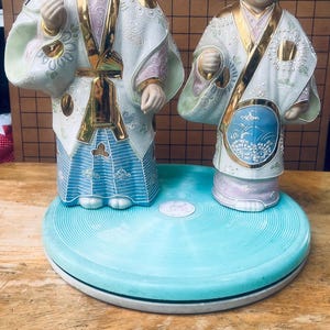 Vintage Japanese Kutani porcelain figurines, often referred to as Jo and Uba, or Takasago dolls