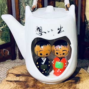 Vintage Miniature Wooden Kokeshi Doll Collectible Figure Pair in Ceramic Teapot
