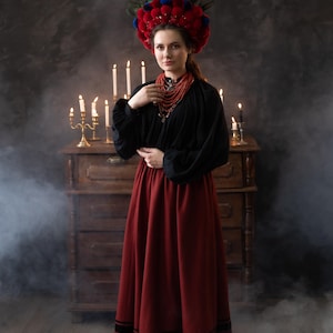 May include: A set of three ceramic mugs with a speckled, matte finish in cream, light grey, and dark grey. Each mug has a simple, minimalist design and a rounded handle.