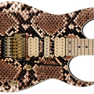 May include: A brown and black electric guitar with a snakeskin pattern. The guitar has a gold bridge and gold tuning pegs.