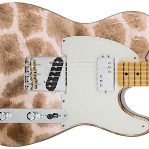 May include: An electric guitar with a giraffe-print design. The guitar has a white pickguard, chrome hardware, and a maple neck with a light-colored fretboard. The body features a brown and cream pattern. The guitar's overall design is striking.