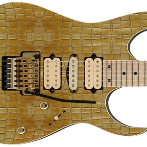 Puede incluir: Una guitarra eléctrica dorada con un patrón de piel de cocodrilo. La guitarra tiene tres pastillas y un puente dorado.