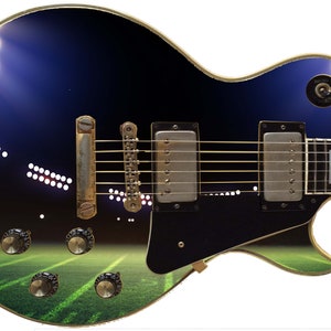May include: A black electric guitar with a custom design featuring a green field and stadium lights. The guitar has gold hardware and a black pickguard.