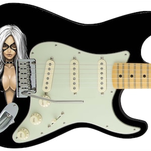 May include: Black electric guitar with a white pickguard and a custom graphic of a woman with white hair and a black mask on the body.