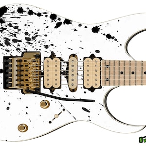 May include: White electric guitar with black paint splatters. The guitar has a black pickguard and gold hardware.