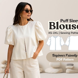 Può includere: Una camicetta bianca con maniche a sbuffo, scollo rotondo e apertura frontale. L'immagine include il testo Puff Sleeve Blouse XS-2XL | Sewing Pattern e Beginner Friendly PDF Pattern, insieme a un disegno tecnico del capo fronte e retro.