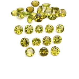 Ronde gefacetteerde peridoot van 7 mm: 34 karaats batch