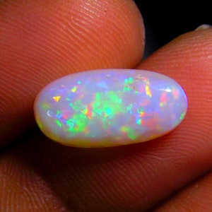 3,30 karat australisk opal cabochon: Oval Multi-Flash ädelsten, oktobers födelsesten