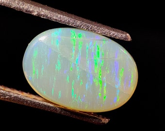 Brazilian Opal Cabochon: Oval Gemstone, Multi-Flash (10.50x7.30x2.50mm)