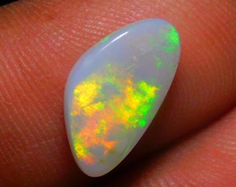 Fancy Natural Brazilian Opal Cabochon: Multi-Color Gemstone (12.40x8x2.80mm)