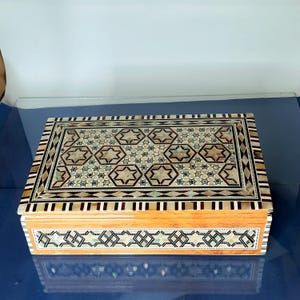 A Unique jewelry box . Egyptian Inlaid Wooden Mother Of Pearl Mosaic Jewelry Box ,inlaid inside and outside..