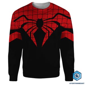 May include: Black sweatshirt with a red spider web design on the front. The spider web is outlined in black and has a black spider in the center.