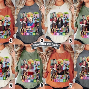 May include: A collection of seven t-shirts in various colors, each featuring a graphic design with the text "BZ WORLDS COLLEGE TOUR" and images of several people. The shirts are available in orange, gray, cream, green, and other colors.