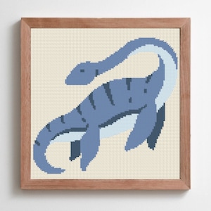 May include: A framed cross-stitch pattern of a blue plesiosaur with a long neck and striped body. The plesiosaur is swimming in a light blue water.