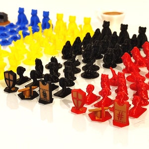 May include: A set of colourful plastic game pieces, including knights, shields, and buildings. The pieces are arranged in rows by colour, with brown, blue, yellow, black, red, and brown.