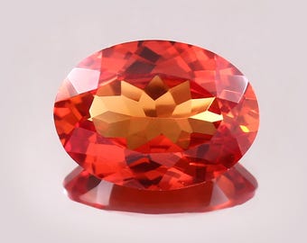 天然ピンクオレンジサファイア 0.64カラット オーバルカット ルース