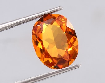 天然ピンクオレンジサファイア 0.64カラット オーバルカット ルース