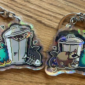 Raccoon Trash Bin Holographic Acrylic Keychains