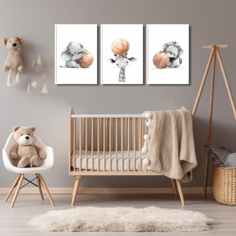 May include: Three framed prints of animals playing basketball. The prints feature a grey elephant, a giraffe, and a lion. Each animal is holding or balancing a basketball.