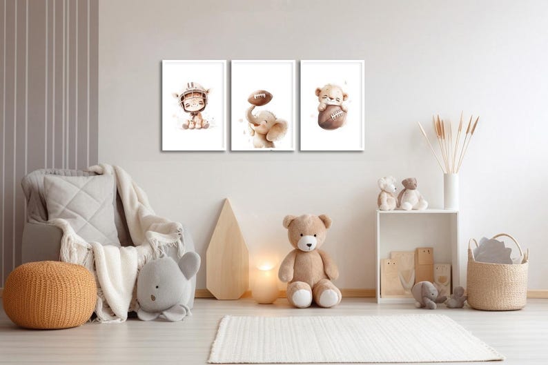 May include: Three framed watercolor illustrations of animals playing football. The illustrations are in a light brown color scheme and feature a giraffe, an elephant, and a bear.